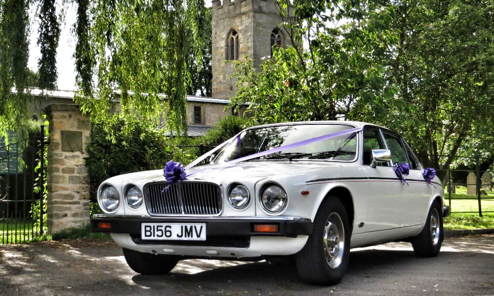 Lincoln Wedding Car Hire - Classic Jaguar XJ6 in Wedding White